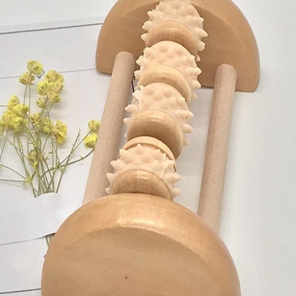 Rouleau de massage pour les pieds en bois